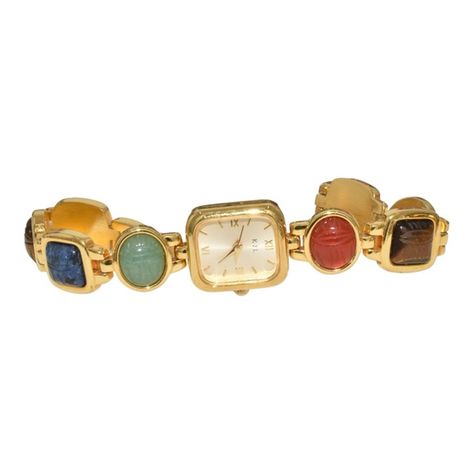 Shop infinia's closet or find the perfect look from millions of stylists. Fast shipping and buyer protection. This vintage Kenneth J Lane wristwatch bracelet features beautiful carved scarab stones set in gold tone metal. Excellent condition. Length 7.75 inches with a fold over clasp. Watch runs. Just installed new battery. Clean crystal with no scratches. One scratch on back of bracelet and a few tiny ones on watch back from battery changes. Other than that this watch looks brand new. Please Ar Accessories, Cell Phone Holster, Phone Holster, Vr Headset, Watch Bracelet, Walker Boots, Kenneth Jay Lane, Blush Makeup, Fit N Flare Dress