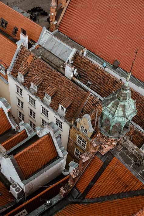 A bird's eye view of rooftops and buildings photo – Poland Image on Unsplash Bird Eye View Architecture, Old City Street, Birds Eye View City, City Street Photography, Architectural Sketching, Poland Cities, City Streets Photography, Gdansk Poland, Life Styles