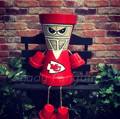 Fun Gardens, Kansas City Chiefs Craft, Chiefs Crafts, Painted Football, Painted Crafts, Clay Pot Projects, Football Crafts, Flower Pot People, Clay Pot People