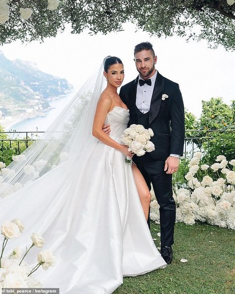 Fans point out odd details in influencer Tobi Pearce and Rachel Dillon's wedding photo: 'Looks AI generated' | Daily Mail Online Rachel J Dillon, Rachel Dillon Wedding, Rachel Dillon, Romantic Ceremony, 2025 Wedding, Kayla Itsines, Hidden Message, Table Wedding, Courthouse Wedding