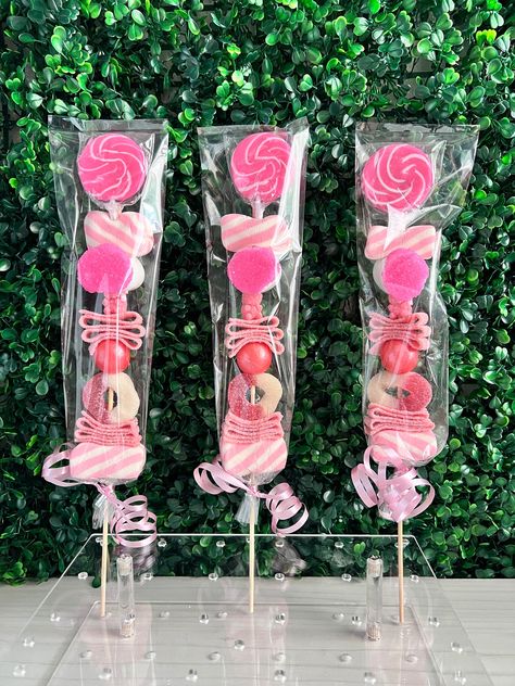 Pink Candy Table, Pink Candy Bar, Gummy Candy Kabobs, Swirl Lollipop, Sour Belts, Candy Kabobs, Girly Birthday Party, Swirl Lollipops, Cake Pop Stands