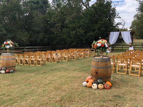 Fall colors wedding aisle decor Fall Backyard Wedding Ceremony, Fall Lake Wedding Ideas Decor, Fall Outdoor Ceremony Decor, Fall Lakeside Wedding, Pumpkin Aisle Wedding, Fall Wedding Aisle Decorations Outdoor, Fall Aisle Decorations Wedding, Fall Wedding Aisle Decor, Fall Wedding Aisle Decorations