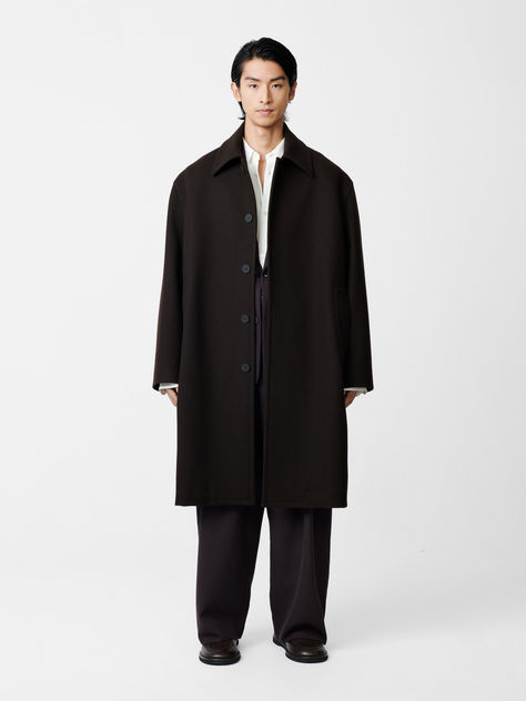 A key style from our AW24 collection, our new Cover Coat in Espresso has been tailored to last a lifetime. Cut from a warm wool blend that hangs beautifully from the frame, it has a boxy, oversized fit and minimal detailing. Black Coat Men, Mens Outwear, Oversized Wool Coat, Long Black Coat, Studio Nicholson, Mens Outerwear, Men's Style, Black Coat, Button Placket