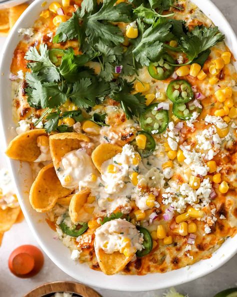 Mexican street corn dip is my go-to cheese dip for parties. This Elote dip recipe is hot, cheesy, and delightfully spicy. Elite Street Corn Dip, Super Easy Dip Recipes, Mexican Pitch In Ideas, Spicy Party Food, Mexican Game Day Food, Texas Themed Appetizers, Fun Dips Recipes Easy, Healthy Party Dishes, Best Football Dips