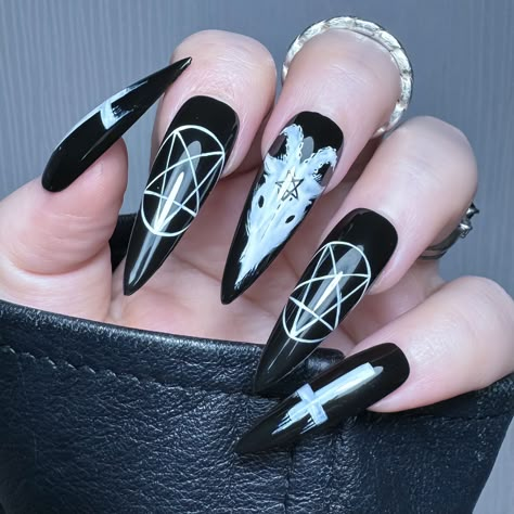 The Core Collection Unleash your dark side with a white hand painted Baphomet inspired design on a black background! Purchase includes; 10 x Apres Gel X Soft Gel Cover Tips 1 x Sizing Kit*1 x Application Kit (Nail File, Cuticle Pusher & Nail Glue OR Adhesive Tabs) See All from Collection: The Core Collection → Long Goth Acrylic Nails, 666 Nails Designs, Goth Coffin Acrylic Nails, Baphomet Nails, Cute Nails Grunge, Short Stilleto Nails Acrylics, Ouija Nail Art, November Stiletto Nails, Pagan Yule Nails