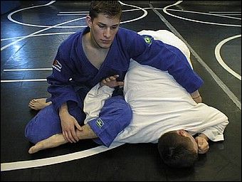 The Omoplata One of the most utilized moves in modern day jiu jitsu, the omoplata is an old position greatly developed in the mid 1990s. This attack can be utilized to submit, sweep (revert) or as a set up for a number of chokes, armlocks, wristlocks and other submissions in jiu jitsu. Arm Lock, Brazilian Jiu Jitsu, Judo, Kickboxing, Taekwondo, Left Hand, Karate, Graphic Novel, Martial Arts