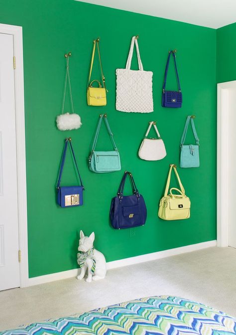 Smart storage that looks cute too - create a decorative purse wall, using the purses to store small play things that can be easily accessed when needed and hung back up on the wall at the end of playtime! Post includes lots of other ideas for decorating kids' rooms too! Purse Wall, Girls Room Organization, Organization Wall, Purse Display, Handbag Display, Driven By Decor, Purse Storage, Handbag Storage, Bag Display