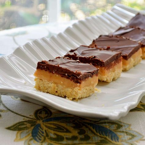 Millionaire Shortbread Recipe, Millionaire's Shortbread, Millionaire Shortbread, Shortbread Recipe, Buttery Shortbread, Shortbread Recipes, Caramel Topping, Shortbread Crust, A Million Dollars