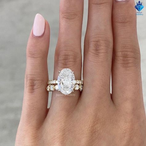 3.50 CT Oval Moissanite Colorless Engagement Ring Set, 14k Gold Oval Diamond Round Eternity Band, Vintage Style Unique Anniversary Ring Set, Valentine Gift, Birthday Gifts, Unique Bridal Ring Set, Oval Moissanite Ring, Ring For Women, Delicate Ring, Gift For Her, Wedding Collection, Fine Jewelry, Custom Ring, Moissanite Wedding Ring Set, Moissanite Jewelry, Women Jewelry, Perfect Gift for Your Love ✥ Product information ✥ ✦ Center Stone: ( M: Moissanite Diamond ) ✦ Stone Shape: Oval Cut ✦ Stone Color: White(D) ✦ Cut Grade: Excellent(VVS) ✦ Weight: 3.50 CT ✦ Stone Size: 12X8MM ✦ Side stones: (M:Moissanite Diamond ) ✦ Stone Shape : Round Cut ✦ Weight: 0.45 CT ✦ Stone Color : White(D) ✦ Clarity : Excellent(VVS) ✦ Make: High quality ✥ You Will Receive ✥ ♦ Engagement ring ♦ Jewelry box ✥ Images Round Eternity Band, Anniversary Ring Set, Moissanite Wedding Ring Set, Oval Moissanite Ring, Oval Moissanite, Moissanite Jewelry, Jewelry Ring Box, Engagement Ring Set, Bridal Ring Set