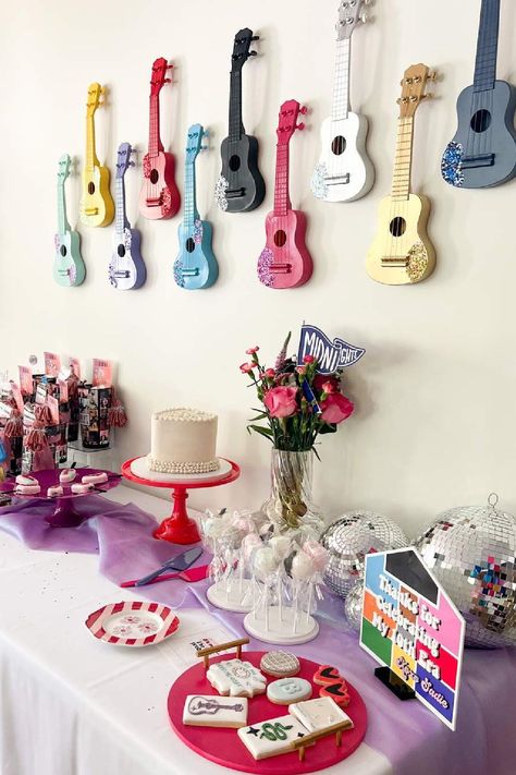 Check out this fun Taylor Swift Eras birthday party!  The guitar backdrop is so cool!! See more party ideas and share yours at CatchMyParty.com Taylor Swift Eras Birthday Party, Taylor Swift Eras Party, Eras Birthday Party, Taylor Swift Cookies, Fun Taylor Swift, Eras Party, Taylor Swift Birthday Party Ideas, Swift Party, Dessert Table Backdrop