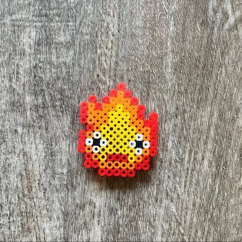 Ikea Pyssla Ideas, Studio Ghibli Calcifer, Ghibli Calcifer, Howl's Castle, Anime Studio Ghibli, Christmas Perler Beads, Anime Studio, Melty Bead Patterns, Pearl Beads Pattern