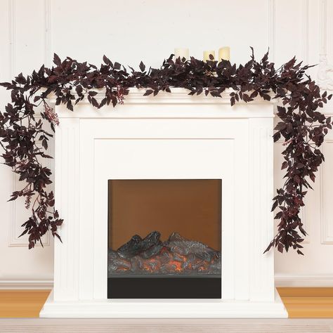 PRICES MAY VARY. Plum Cimicifuga Seeded Garland: the fall leaves garland is meticulously designed with a length of 6 ft/ 183 cm; This size makes it versatile enough to drape over your mantel, dining table, or even around doors and windows; It's capable of adding warmth and charm to various spaces within your home Intriguing Plum Color: our realistic garland comes in a rich plum color that captures the warm colors of autumn; This deep purple red color looks genuinely like autumn leaves; Whether i Fall Garland Mantle, Realistic Garland, Fall Mantle Garland, Plum Plant, Halloween Fireplace Mantle, Plum Decor, Garland For Fireplace, Fireplace Dining, Autumn Garland