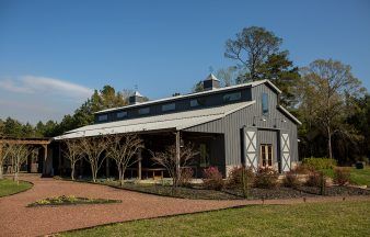 Metal Wedding Venue & Barn Building | Steel Venue Builders Event Venue Design, Equestrian Building, Post Frame Construction, Morton Building, Open Floor Plans, Gambrel Roof, Pole Barns, Metal Barn, Stone Siding