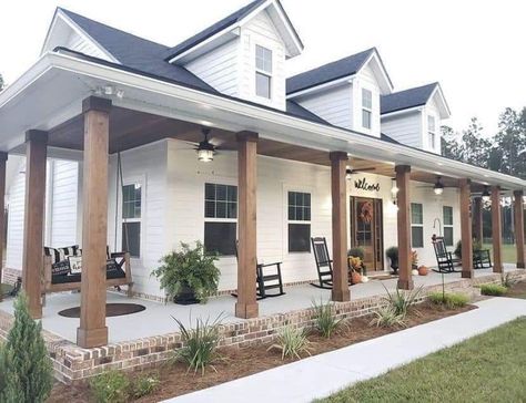 Wood Beams Outside Of House, Country Ranch Style Homes Farmhouse Wrap Around Porches, L Shape Porch Ideas, White House Black Windows Wood Accents, White Farmhouse With Shutters, Small Farmhouse Exterior Ideas, White Rustic House Exterior, Remodel Front Of House, White House Black Trim Cedar Accents Farmhouse