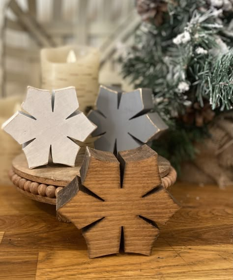 "These wood snowflakes are perfect for your rustic/neutral winter decor.  They are the perfect size for your tiered tray, shelves, mantels, and table scapes. The snowflake measures approximately 3 1/2\" x 3 1/2\" x 1 1/2\" Stained (Provincial)  White distressed  Light gray distressed  ✅ If ordering multiples please specify colors wanted in the note to seller. These snowflakes are stained and hand painted and will vary in color and distressing.  * wood stained snowflakes may have show more grain Farmhouse Snowflake Christmas Tree, Xmas Wood Art, Rustic Wood Christmas Ornaments, Rustic Wood Projects To Sell, Woodwork Christmas Gifts, Moose Wood Crafts, Wooden Things To Make And Sell, Scrap Wood Projects Christmas, Diy Wooden Decor