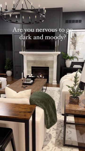 Dark Accent Wall White Fireplace, Black Fireplace Wall With Windows, Dark Color Fireplace Ideas, Black Fireplace With Black Wall, Dark Wall Light Fireplace, Black Wall Family Room, Sw Iron Ore Living Room, Dark Wall With White Fireplace, Stone Fireplace Dark Walls