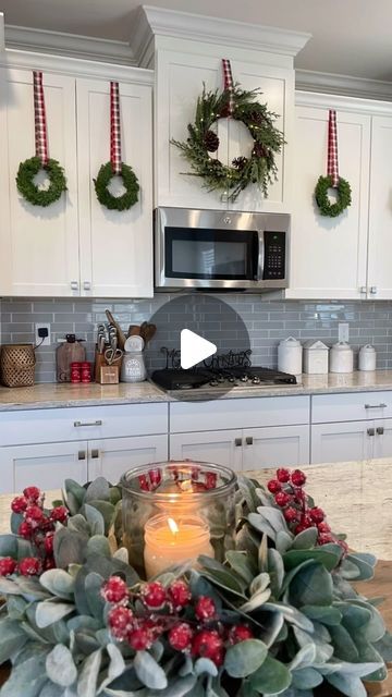 Liz Grella on Instagram: "One of the easiest ways to add cheer to your kitchen cabinets. I’ve also added just ribbon. But this is by far my favorite Christmas kitchen look.   I measure out the ribbon first-I recommend leaving it a little longer than you think you might need. I then use duct tape(yes, duct tape) on the inside of the cabinet. You can also use upside down command hooks. Duct has never damaged my cabinets. You can test it on a small area to make sure.   Comment WREATH for direct links sent directly to you. *Price for wreaths is for a set of 6!  #christmasdecor #christmasinspiration #christmasinspo #christmastime #christmasdecorating #christmaswreaths #christmaskitchen" Wreaths On Kitchen Cabinets, Michael Buble Christmas, Wreath Inside, Christmas Bows Diy, Christmas Tree Bows, Christmas Themes Decorations, Small Wreaths, Christmas Kitchen Decor, Diy Christmas Decorations Easy