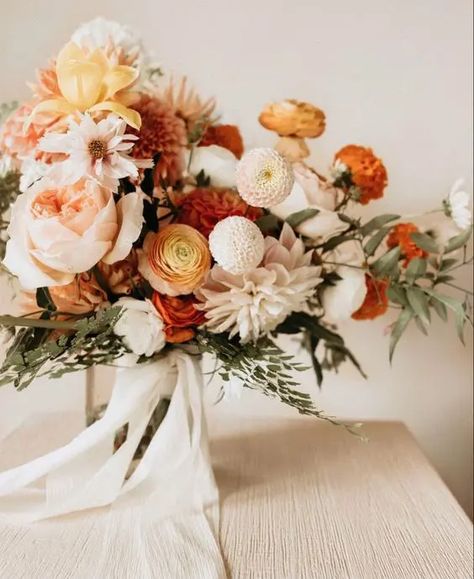 a chic fall wedding bouquet of white dahlias, blush peonies and white and orange peony roses, some white roses, greenery and white ribbons Pillar Wedding Flowers, Mexican Wedding Bridal Bouquet, Peony Fall Wedding Bouquet, Rust And White Wedding Flowers, Rust And Blush Wedding Flowers, White And Rust Bouquet, Early Fall Wedding Bouquets, Orange And White Flower Bouquet, Rust Bouquets