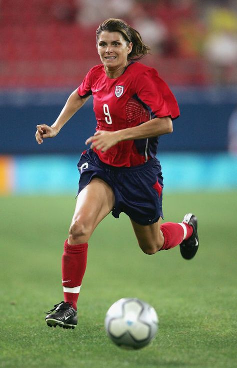 One of the best women's soccer players in history, Mia Hamm became the youngest player to join the U.S. women's national soccer team. She went on to lead the U.S. team to two World Cup victories in 1991 and 1999 and two gold medals. Retired in 2004, the 44-year-old is married to retired baseball all-star Nomar Garciaparra and they have twin girls and a son. She also runs the Mia Hamm Foundation, which supports organized sports for girls and helps families in need of bone marrow and cord blood tr Mia Hamm, Female Soccer, Women's Soccer Team, Usa Soccer Women, Women’s Soccer, Sports Awards, Soccer Motivation, Soccer Quotes, Sport Icon