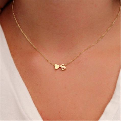 Pendant necklace of your initial and tone choice - either silver or gold plated. We are currently out of stock on Gold “K”, Gold E, Gold D, Gold R, and Silver S, Silver A charms...if you would like one of these, it takes about 4 weeks turn-around time! Otherwise, we have all of the other initials! Dainty Initial Necklace, Dunhuang, Heart Choker Necklace, Heart Choker, Initial Necklace Gold, Initial Pendant Necklace, Letter Pendants, Initial Pendant, Letter Necklace