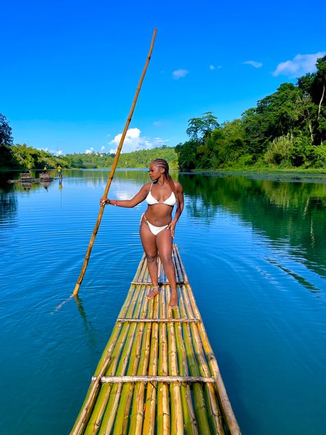 Black girl in Jamaica at the Rio Grande River in Port Antonio. Crystal clear Blue, Green waters. On a Green Bamboo raft. Jamaica Raft Pictures, Bamboo Rafting Jamaica Pictures, Jamaica Clothes, Rafting Jamaica, Jamaica Pictures, Bamboo Rafting, Vacay Pics, Vacation Board, Jamaica Trip