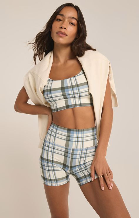 Meet your new workout essential, featuring a vibrant blue and green plaid print and built-in shelf bra with removable pads for customizable support. Designed with a scoop neck and crafted from our signature Pure Performance fabric, it ensures both style and functionality with moisture-wicking properties. Z SUPPLY Activewear Women's Shine Plaid Bra, Sandstone, Medium Blue And Green Plaid, Paris Blues, Knit Bottom, Black Midi Skirt, Vibrant Blue, Shelf Bra, Performance Fabric, Green Plaid, Plaid Print