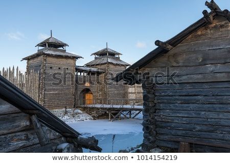 Ancient wooden fortress at sunset. Ancient wooden fortress and log huts. Russian village in the winter. Russia. Suzdal. Golden ring. Wooden Fortress, Russian Village, Fantasy Images, Golden Ring, Wooden Ring, High Fantasy, Dark Ages, Wooden Rings, In The Winter