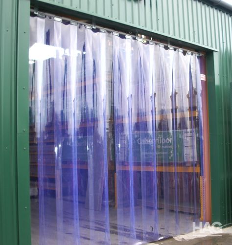 Durable PVC strip curtain fixed overhead to allow for quick entrances and exits in busy industry premises. Clear PVC strip curtains allow for through vision while offering a level of thermal protection. #doors #speeddoors #thermaldoors #thedoorspecialists Strip Curtains, Door Stripping, Plastic Curtains, Cute Curtains, Plain Curtains, Door Insulation, Farm Buildings, External Doors, Floral Curtains