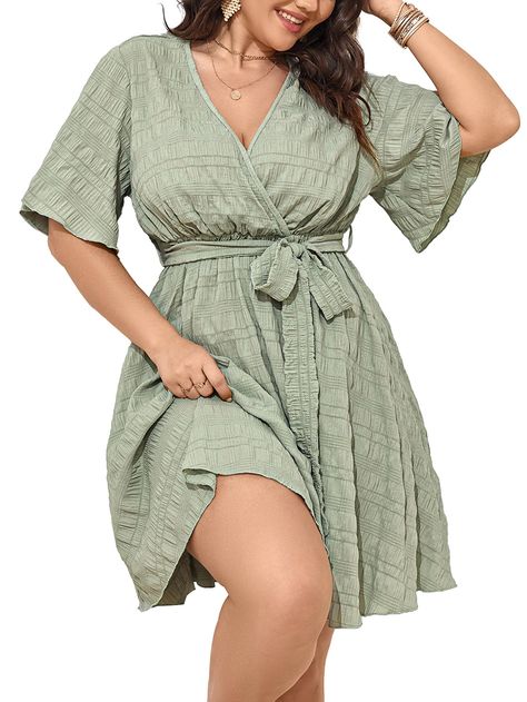 PRICES MAY VARY. Material: This plus size summer dress is made in special texutred farbic, it's soft and skin-friendly, you will stay in comfortable a day along Show Your Feminine: The plus size dress's style is deep v neck short sleeve a line short dress, elegant and sexy. Together with the design of ruffle sleeves and waist belt, there is a good effect of covering meat, showing your slim figure and feminine silhouette Match: The highly anticipated plus size mini dress is the perfect piece for Dresses For Apple Shaped Women Over 40, Plus Size Bridal Shower Outfit Guest, Plus Size Mexico Vacation Outfits, Clothes For Short Curvy Figures, Proposal Outfits For Her, September Wedding Guest Dress, Wedding Guests Outfits, Short Dress Elegant, Wedding Guest Dress Cocktail