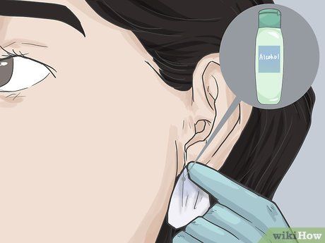 How to Pierce Your Ear with a Safety Pin: 15 Steps (with Pictures) Pierce Your Own Ears, Piercing Needle, Piercing Needles, Useful Life Hacks, Safety Pin, Ear Piercings, At Home