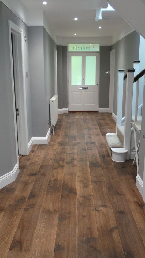 Farmhouse Flooring Living Room, Dark Rustic Hardwood Floors, Wood Flooring Ideas With Oak Trim, Basement Wood Flooring Ideas, Hardwood Floor Farmhouse, Rustic Modern Flooring, Chestnut Flooring Kitchen, Farmhouse Dark Wood Floors, Country Home Flooring