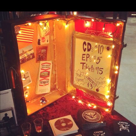 The merch display I created with a friend by revamping a vintage suitcase Suitcase Merch Display, Band Merch Booth Display Ideas, Band Merch Display Ideas, Band Merch Table Display, Band Merch Table, Merch Table Ideas, Diy Band Merch Ideas, Band Merch Display, Diy Merchandise Display