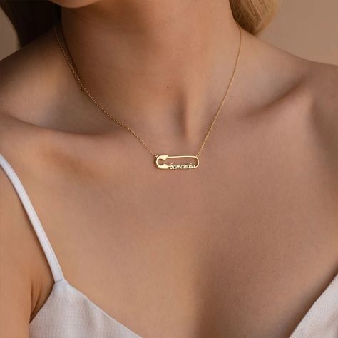 ✨ Shine with a touch of gold! ✨ Our Custom Double Name Paper Clip Pendant Necklace is the ultimate gift for your special someone – be it girlfriend, mom, or YOU! 💖 Personalize it, flaunt it, LOVE it! Click here to make it yours: https://nuel.ink/nqeHVm #PersonalizedJewelry #GiftsForHer #ShineBright 😘😍 Name Necklace Silver Personalized, Unique Name Necklaces, Name Jewelry Necklace, Safety Pin Necklace Meaning, Gold Name Necklace Unique, Personalized Necklace Names, Name Pendant Gold, K Pendant, Paper Clip Necklace