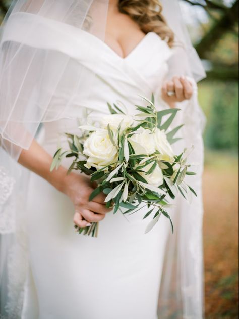 Simple Bridal Bouquetwhite rose with olive leaves and eucalyptus Irish Bouquet Wedding, Italian Ruscus Bridesmaid Bouquet, White Rose And Eucalyptus Bouquet Simple, Wedding Decoration With Olive Leaves, Olive Branch Bridal Bouquet, Olive Leaf Bouquet Wedding, Bridal Bouquet Olive Leaves, Wedding Flowers With Olive Leaves, Olive And White Roses Wedding