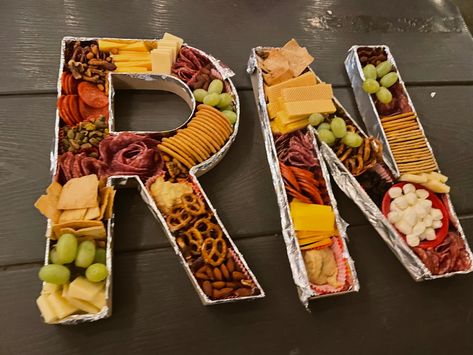 Letter R Charcuterie Board, Cheese Board Letters, Nurse Charcuterie Board, Letters With Food Inside, Letter Food Ideas, Slp Party Ideas, Letter Trays For Food, Charcuterie Board Letters, Food Letters