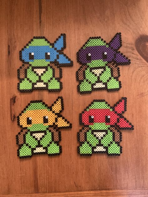 TMNT Perler Bead are read to shell shock! Discount when buy all 4! Pirate Perler Beads, Medium Size Perler Bead Patterns, Beads Perler Ideas, Ninja Turtle Perler Beads, Roblox Perler Bead Patterns, Perler Beads Turtle, Ninja Turtles Perler Beads, Ninja Turtle Perler Bead Pattern, Perler Bead Patterns For Adults