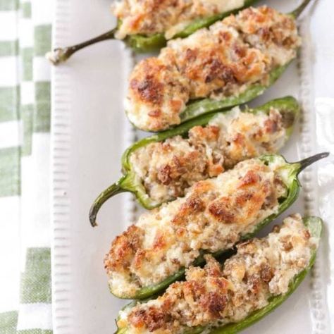 Sausage Stuffed Jalapenos {+VIDEO} | Lil' Luna Sausage Stuffed Jalapenos, Cream Cheese Stuffed Jalapenos, Stuffed Jalapeños, Stuffed Jalapenos, Ground Pork Recipes, Mexican Appetizers, Italian Sausage Pasta, Jalapeno Recipes, Grilled Peppers