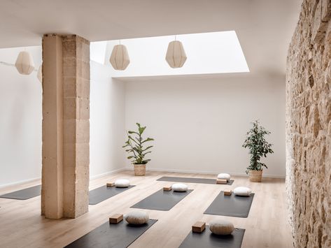 We designed this yoga studio to be a calm and relaxing space. It is the perfect space to disconnect from the busy city life. Small Yoga Studio, Pilates Studio Design Interiors, Yoga Studio Interior, Yoga Room Design, Home Yoga Room, Studio Pilates, Meditation Studio, Yoga Studio Design, Wellness Studio