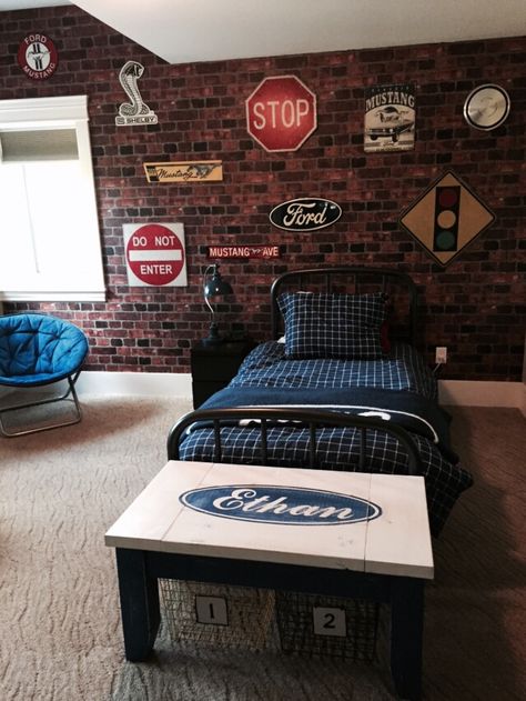 50 Teenage Boys Room Ideas and Designs We Love Street Themed Bedroom, Brick Wallpaper Bedroom Boys, Road Signs Bedroom Decor, Brick Wallpaper Boys Bedroom, Ford Bedroom Ideas, Vintage Car Room For Boys, Road Signs Bedroom, Car Room Ideas For Boys, Teenager Room Ideas For Boys