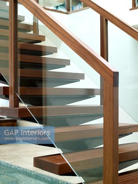 Detail of modern wooden and glass staircase Glass Guardrail, Staircase Glass Design, Wooden Staircase Railing, Glass Staircase Railing, Wooden Staircase Design, Glass Stair, Glass Railing Stairs, Staircase Design Modern, Staircase Railing Design