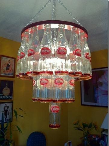 What to do with those old Cheerwine bottles? Glass Coke Bottle Crafts, Coke Bottle Crafts, Glass Coke Bottles, Bottle Chandelier, Shop Displays, Rainy Day Crafts, Craft Easy, Bottle Craft, Unique Chandeliers