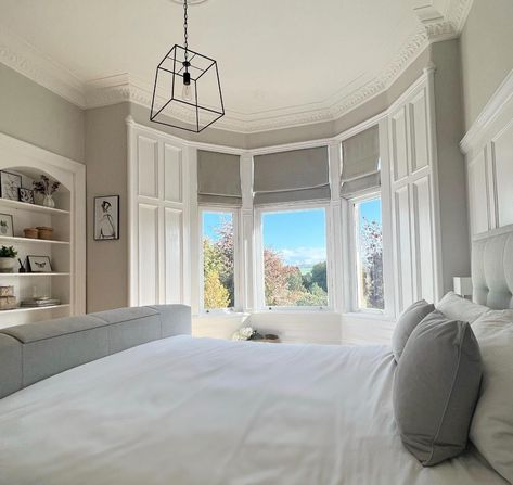 Master bedroom with large bay window painted in Cornforth White White Curtains Bay Window, Primary Bedroom Bay Window, Bay Window Bedroom Layout Master Suite, Bedroom Ideas Bay Window, Bedroom Ideas With Bay Window, Bay Window Panelling, Bay Window Bedroom Layout, Bay Window In Bedroom, Bay Window Ideas Bedroom