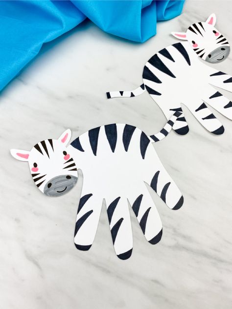 If you're looking for a fun and easy wild animal craft for kids, this handprint zebra craft is perfect! Download the free printable template and make with toddlers, preschool and kindergarten children at home or in the classroom.#simpleeverydaymom #handprintcrafts #wildanimalcrafts #animalcrafts #zebracrafts #kidscrafts #craftsforkids Zebra Crafts Preschool, Zebra Craft, Safari Crafts, Jungle Crafts, Zoo Animal Crafts, Pig Crafts, Zebra Art, Alphabet Crafts, Animal Crafts For Kids