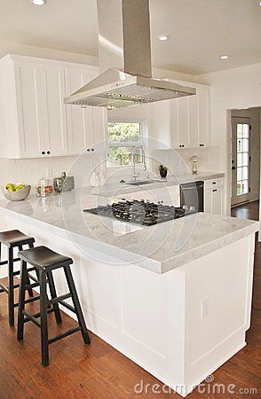 Kitchen Stove Top Island Stock Photos, Images, & Pictures – (490 Images) - Page 4 Stove Hoods Ideas, Oven In The Island, Kitchen Stove Hoods Ideas, Stove Top Island, Kitchen Stove Hoods, Carrara Marble Countertops, Peninsula Kitchen Design, Kitchen Island With Cooktop, Kitchen Stove Top