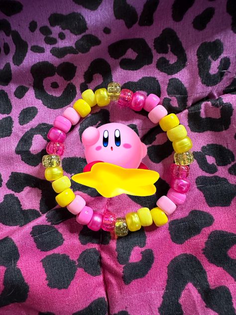 pink & yellow 💛  + glitter pony beads ✨ handmade kandi bracelet single - LUVSCENE Pony Bead Bracelets Words, Kirby Kandi Pattern, Easy Kandi Cuff, Kandi Inspiration Pony Beads, Barbie Kandi, Scene Kid Bracelets, Kandi Bracelets Ideas Singles, Kirby Bracelet, Yellow Bracelet Ideas