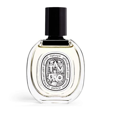 Diptyque Tam Dao Eau de Toilette is a sweetly spice, aromatic wood fragrance that starts off with a more pine-like woodiness that transforms into a cedar-sandalwood mix--creamy but aromatic--and then eventually, heavy on sandalwood in its smooth, creamy form with rose to round it out. The drydown had light spices and golden amber whispers that accentuated the sandalwood, while a touch of musk came through. These are the notes: top notes: Italian cypress, myrtle, rose heart notes: sandalwood, ced Diptyque Do Son, Diptyque Perfume, Do Son, Italian Cypress, Sandalwood Fragrance, Perfume Reviews, Solid Perfume, Woody Fragrance, Flower Stands