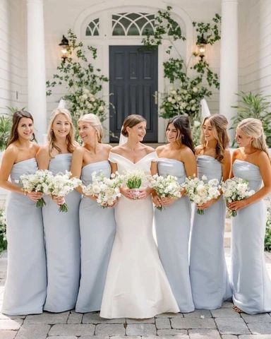 Light Blue Bridesmaid Dresses: How to Choose the Best Shade | Bella Bridesmaids Light Blue Bridesmaid Dresses, Light Blue Bridesmaid, Women Standing, Blue White Weddings, White Bridesmaid, Light Blue Wedding, Something Blue Wedding, Spring Wedding Colors, Blue Themed Wedding