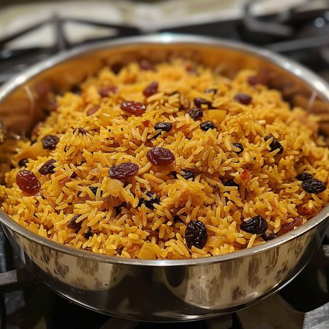 🍛 Elevate your meals with Curried Rice with Raisins, a sweet and savory fusion. #CurryFlavor 🍽️ Curried Rice with Raisins 🛒 Ingredients: 2 cups basmati rice 4 cups water 1 tbsp curry powder 1/2 cup raisins 1 onion, diced 2 tbsp butter Salt to taste 👩‍🍳 Instructions: Sauté: In a pan, cook onion in butter until soft. Cook Rice: Add water, curry powder, salt, and rice. Bring to boil. Simmer: Add raisins, cover, and simmer until rice is cooked. 🌟 Enjoy this aromatic dish that blends the sweet... Rice With Raisins, Curried Rice, Cook Rice, Instagram Recipes, Twisted Recipes, Curry Rice, Curry Spices, Global Cuisine, Trending Recipes