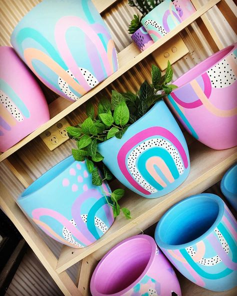 Ash In Wonderland on Instagram: “#shelfieoftheday  Can’t wait to tell you where all of these planters are headed 🤫💕 What a weekend! 🌈💖🎨 #abstractart #paintedpots…” Plant Pot Design, Flower Pot Art, Plant Pot Diy, Painted Pots Diy, Painted Plant Pots, Pots And Planters, Diy Flower Pots, Decorated Flower Pots, Pottery Painting Designs