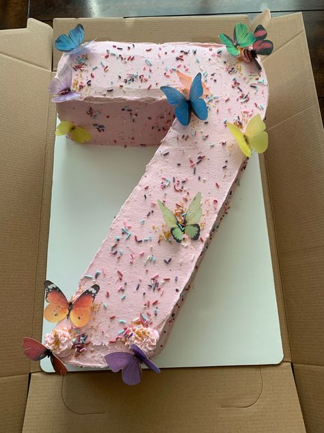 Number 7 cake with butterflies How To Make A Number 7 Cake, 7 Shaped Birthday Cake, Number 11 Birthday Cake, 7 Cake Number, Number 7 Cake Girl, 7 Number Cake, Butterfly Number Cake, Number 7 Birthday Cake, Number 7 Cake